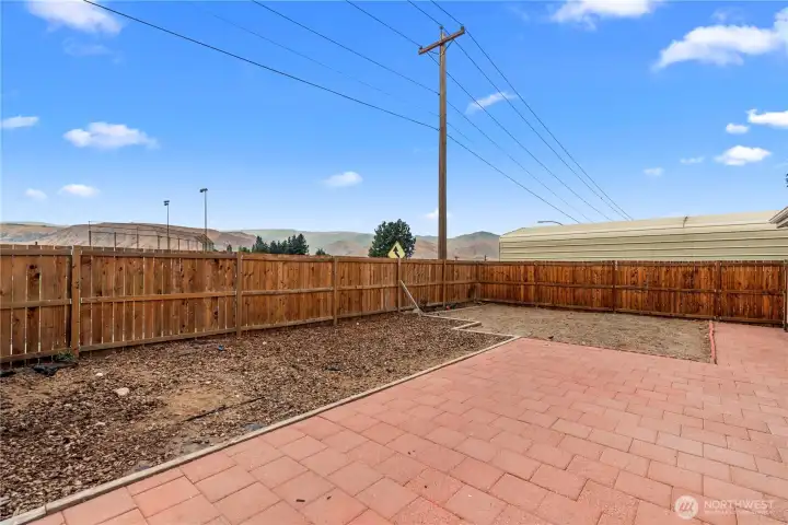 The backyard is ready for a new vision! Irrigation water available!