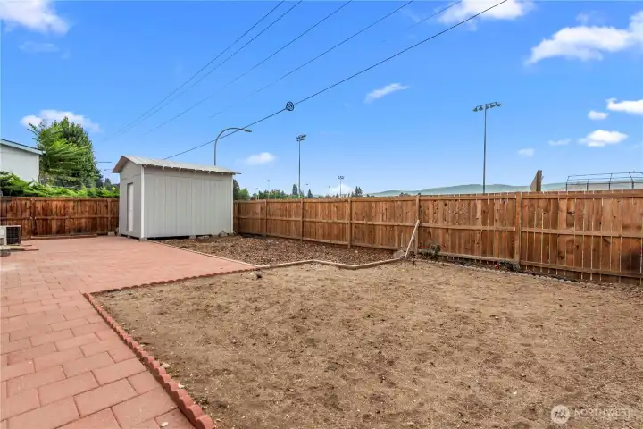 The backyard is ready for a new vision! Irrigation water available!