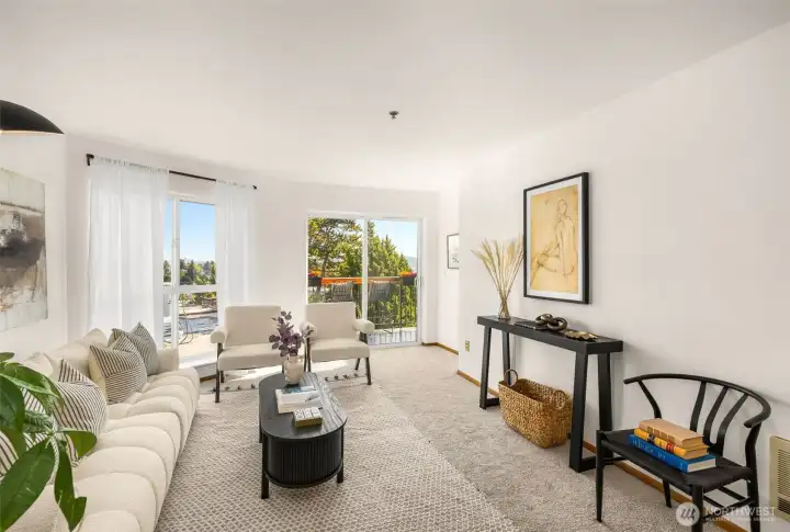 Large window! Slider to private deck for effortless indoor-outdoor living.