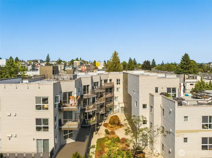 The Cobrizo building is U-shaped with lush, peaceful courtyard in the center. Back bldg enjoys minimal road noise!