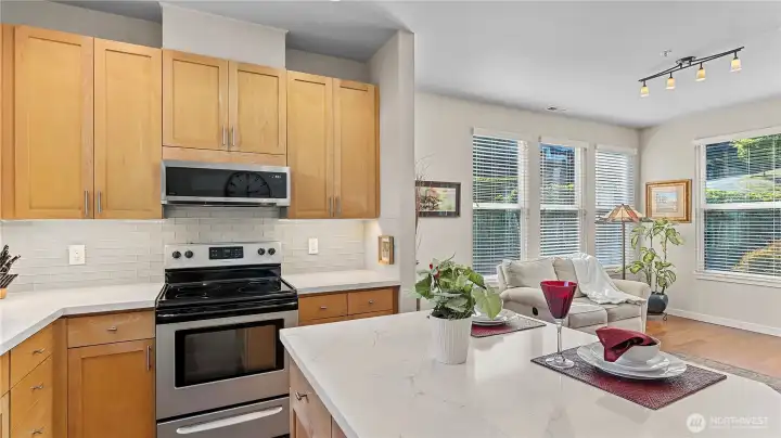 Showing the Family Room off the Kitchen, this home is Offering a Family Room and a Formal Living Room!