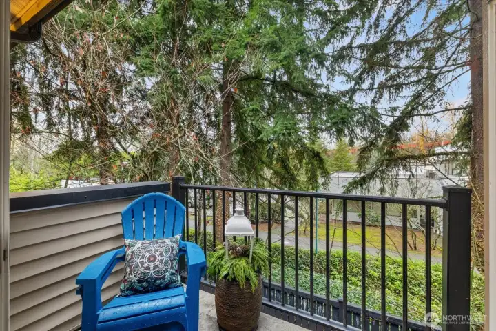 Private patio over looking nature trail. Bring your BBQ and hang some lights!