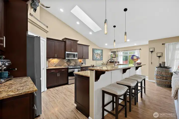 Modern, sleek kitchen with breakfast bar