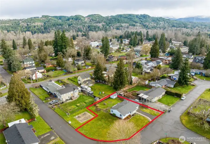 Wonderful level corner lot...room to play!  The concrete pad is a solar powered Dept of Ecology stormwater monitoring station.  The home and property are NOT in the flood plane.