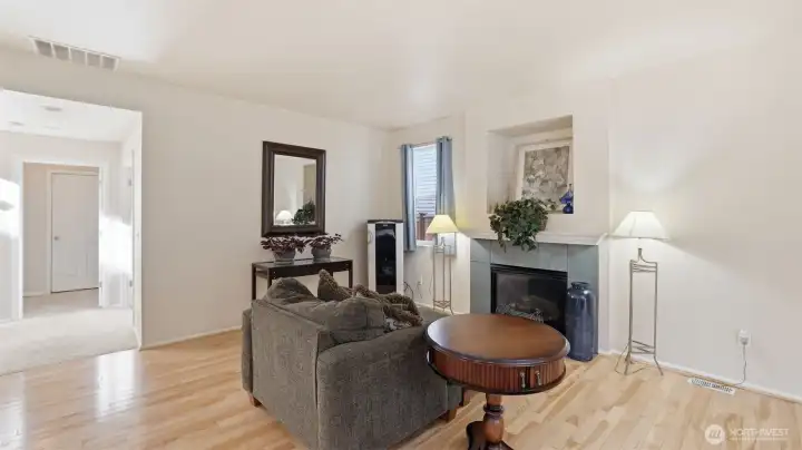 This inviting living room offers the perfect canvas, ready for you to make it your own.