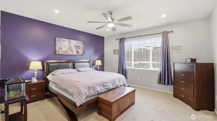 Bright and inviting, this primary suite offers a calm and comfortable place to start and end your day.