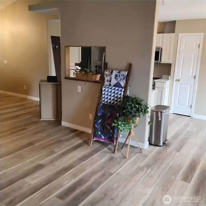 Family room looking towards Kitchen with a pass thru window.