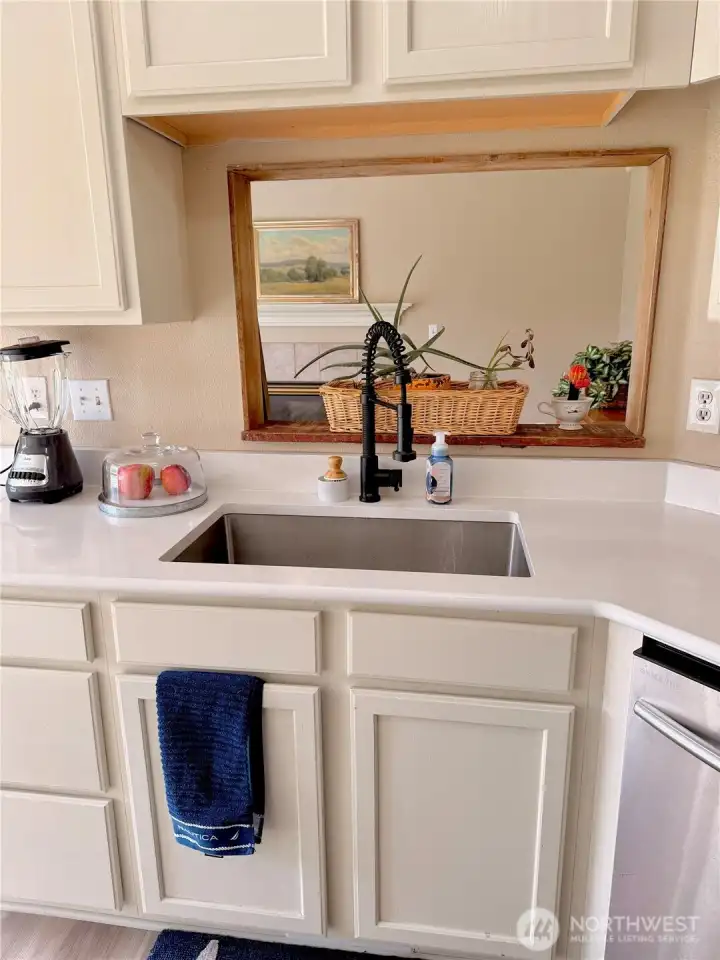 Kitchen with pass thru to Family Room