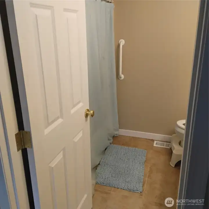 Bathroom off of the Main bedroom has a full-size tub/shower
