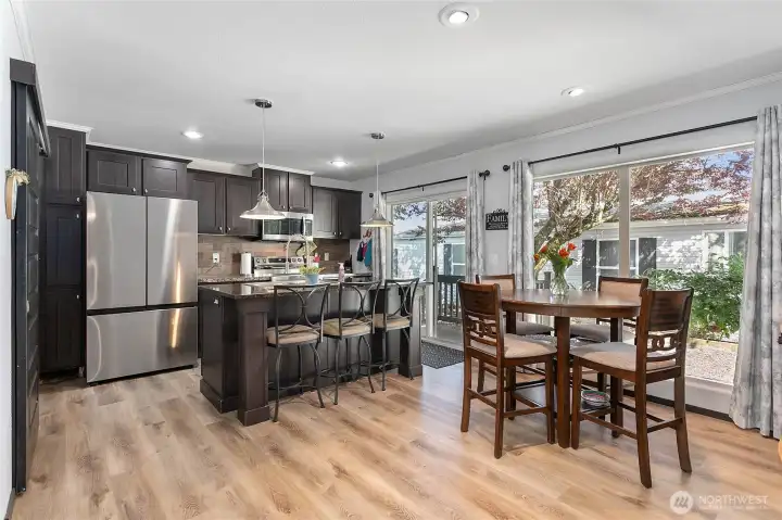 Open concept kitchen/dining/living