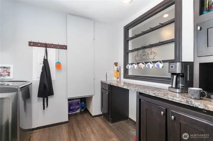 Laundry room with room for coffee bar and storage