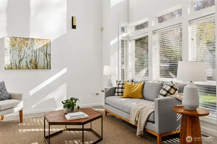 Windows look out on expansive patios and lawn & garden