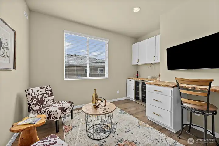 The Den features a built-in Beverage Center and Butcher Block counters