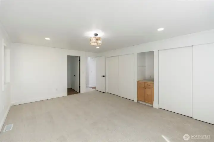 Double closets in the primary bedroom.