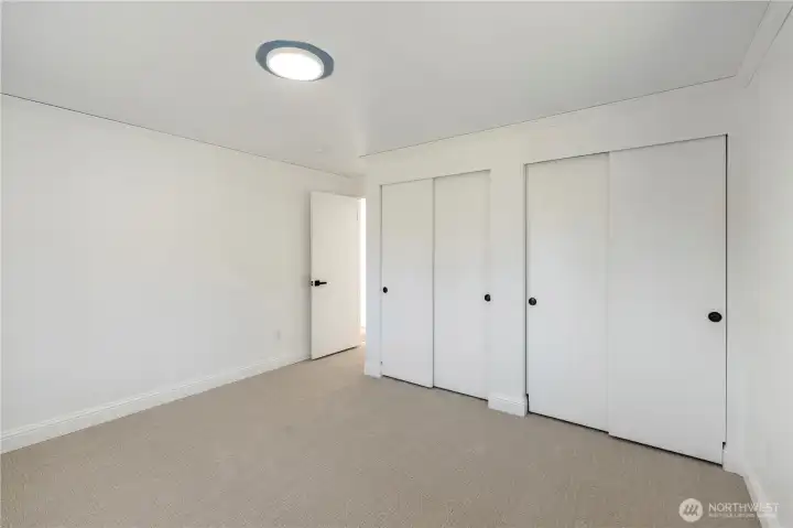 Double closets in the secondary bedroom.