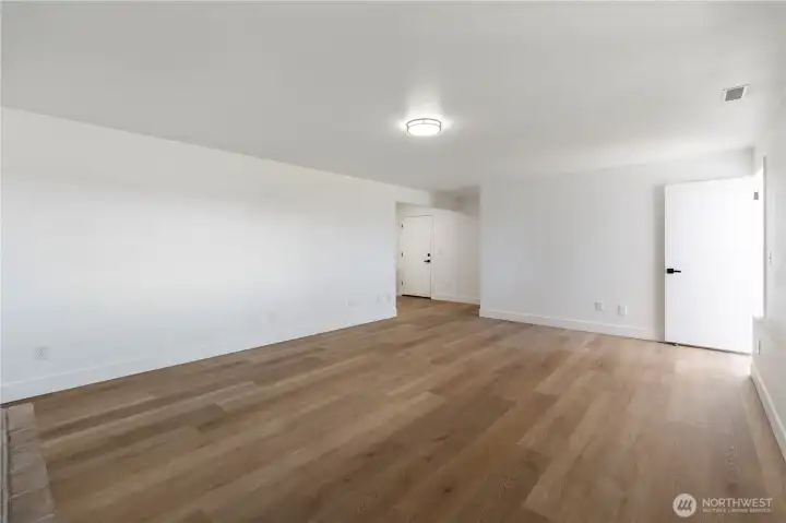 Bright flex space with clean finishes and multiple use options.