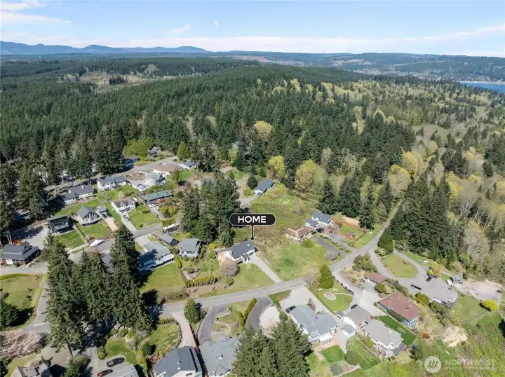 Elevated perspective showing the property's proximity to expansive greenbelts and local amenities.