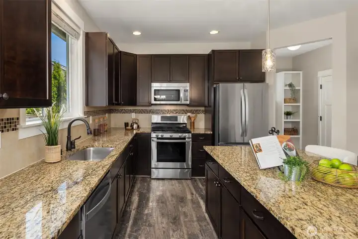 Gas cooktop and a brand new stainless refrigerator