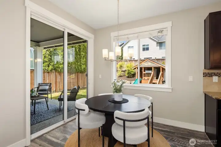 The dining room opens to a covered patio space