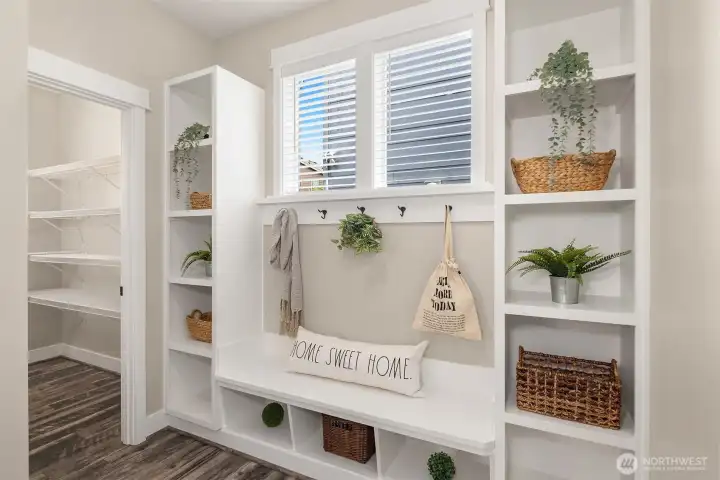 Such a great, space to keep bags, books and boots organized as you come and go!
