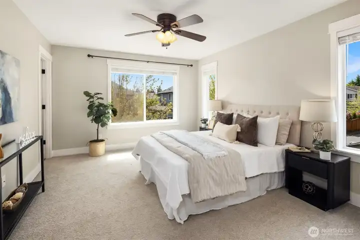 Luxurious primary bedroom suite