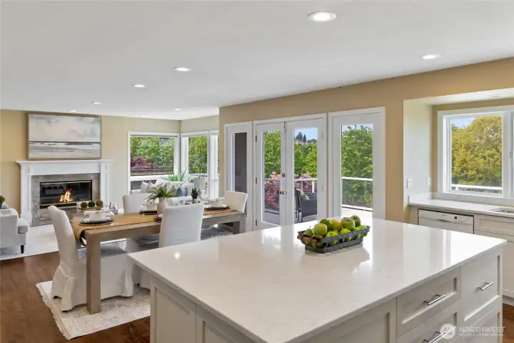 Expansive great room with ideal layout for both everyday living and entertaining, highlighted by view windows and access to outdoor living spaces.