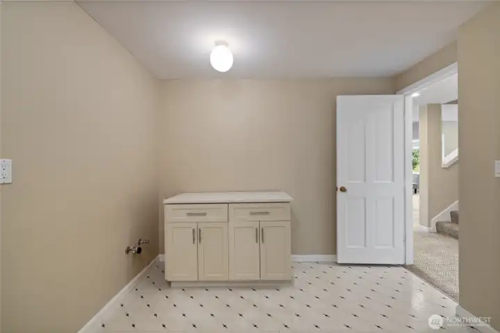 Plumbed for sink, possible kitchenette, workout room/flex.