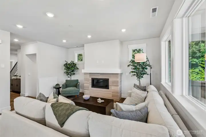 Gas fireplace warms the relaxing great room. Photo is same floor plan on Lot 1-homesite details can vary-see site agent