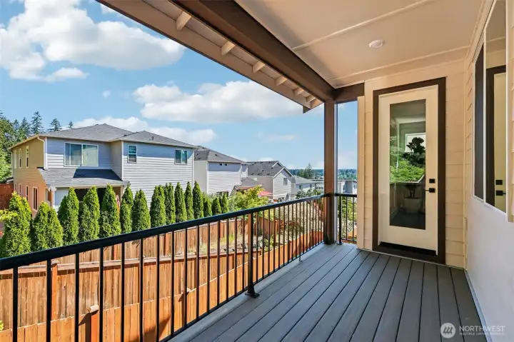 Weather is not a concern enjoying the covered rear yard deck off main level featuring a gas stub for a barbeque grill and relaxing partial Cascade mountain views. Photo is same floor plan on Lot 1-homesite details can vary-see site agent