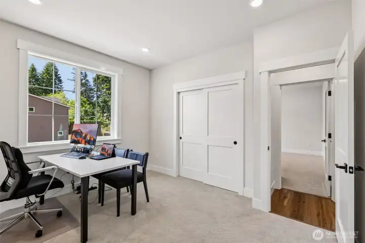 Upper 2nd bedroom offers functionality as a potential home office space. Photo is same floor plan on Lot 1-homesite details can vary-see site agent