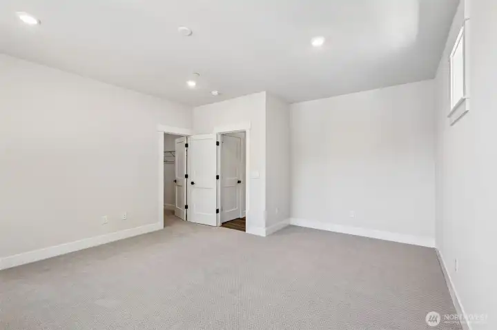 Additional alcove in the primary bedroom could be a cozy reading nook. Photo is same floor plan on Lot 1-homesite details can vary-see site agent
