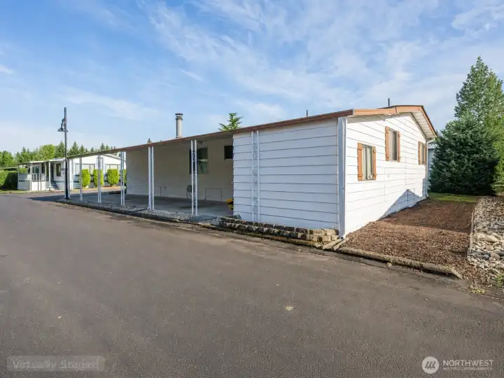Carport with storage space.