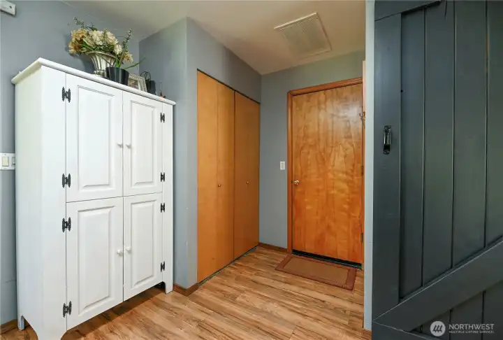 Hallway to closet and garage.
