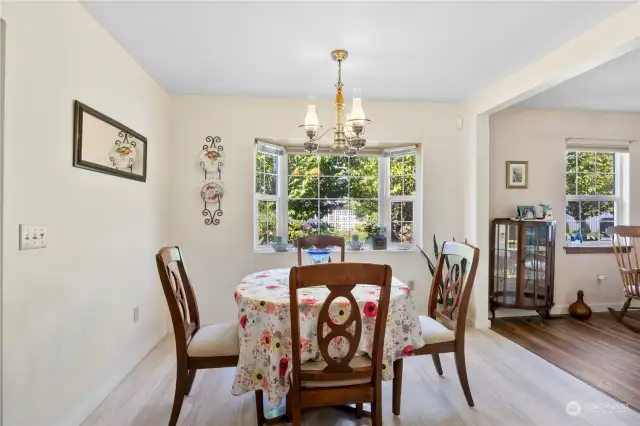 Dining room w/garden window opens to the kitchen & family room