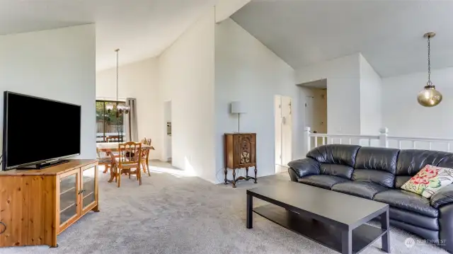 Enjoy vaulted ceilings in the main living space, showcasing the open and spacious floor plan.