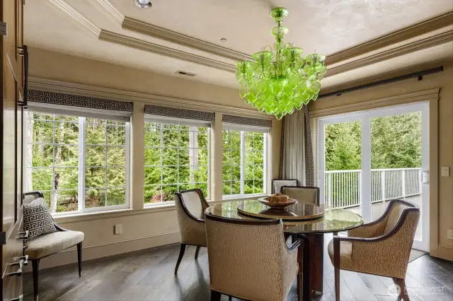There are 2 large sliders, both open out to the deck that runs the length of the home overlooking the protected forestry.