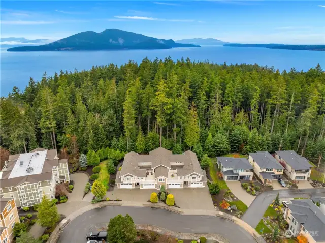 Enjoy daily walks through 220 acres of Washington Park, with this condo backing onto protected forest lands for unmatched privacy.