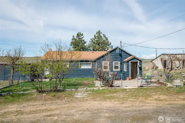 Front of home with lots of extra parking.