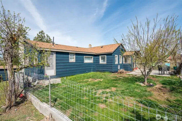 Fenced front yard.
