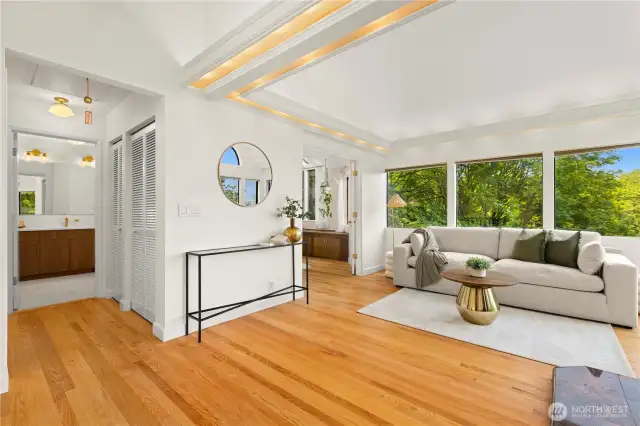 There is a circular floor plan. Living room, bedroom, vanity room with walk in closet out to the 3/4 bath.