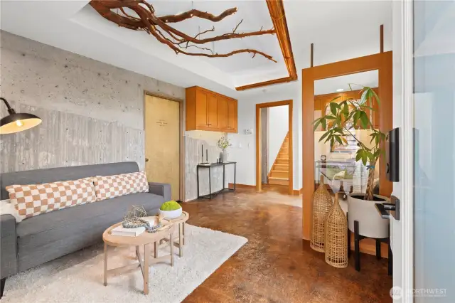 The Dadu has two entry points. From the front door you enter in to the living room or office space or both! The door to the left is to an extra large storage room and Utility room.