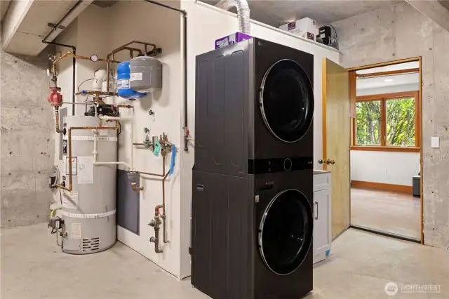This shows a picture of the new washer and dryer that is now up in the Dadu.
