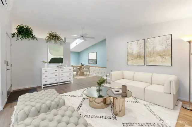 Flexible layout with updated flooring, fresh finishes, and a direct connection between living and dining areas—perfect for gathering or relaxing. (Virtually Staged)
