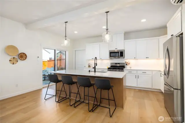 This is a dream kitchen w/a gas range, upgraded dishwasher and frigde.