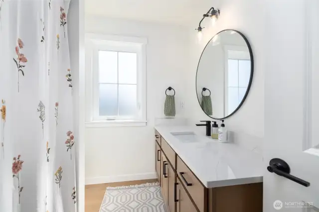 Light, bright and spacious upstairs bathroom.