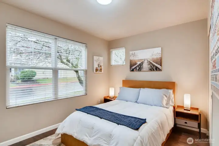 Entry-level third bedroom with natural light and versatile layout options.