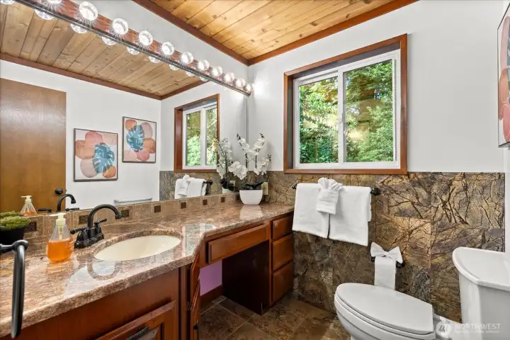Main-level powder room in the main home.