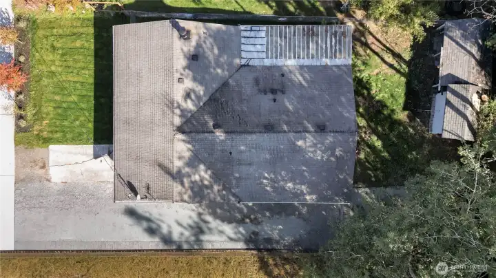 Good sized lot with a storage shed and covered patio.