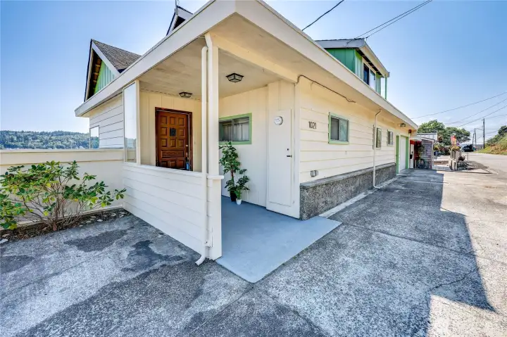 Entrance to home from street.  There is a lot of parking at this home which is a big plus on Shore Drive.