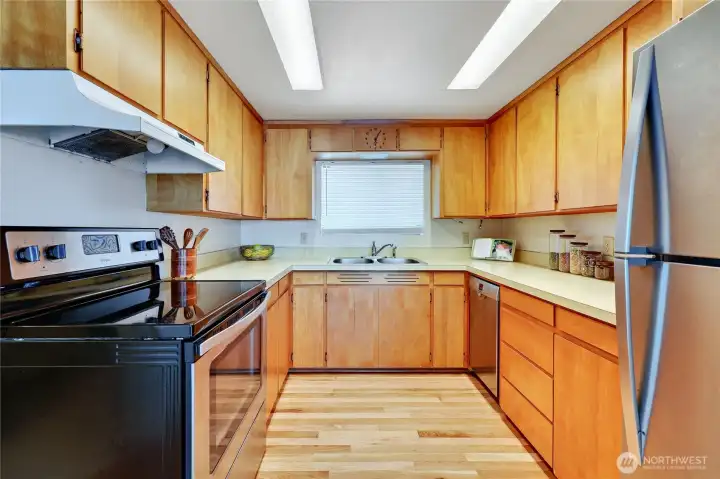 Adorable and functional kitchen.